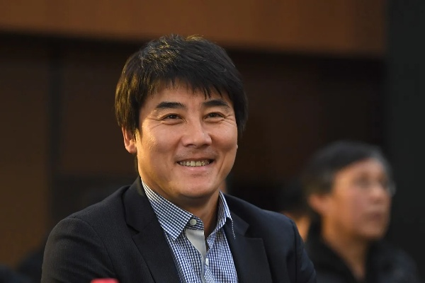 李明，足球运动受国家重视，机遇与挑战并存